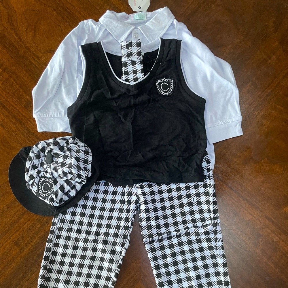 5 piece toddler outfit. Long pants, long sleeve polo shirt, vest, tie, hat. 4T